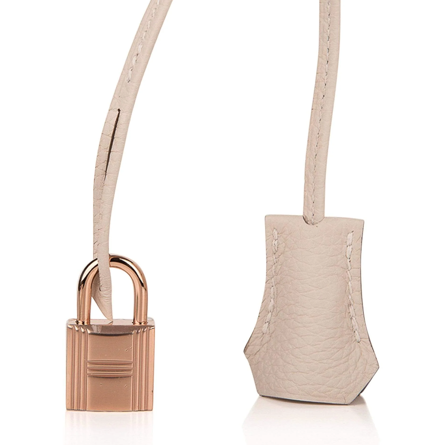 Gentle Pale Chalk Neutral Grain Medium Structured Trapezoid Tote With Warm Blush Rose Gold Twist Lock Hardware And Matching Suspended Metal Padlock Charm